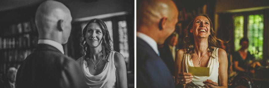 The bride reads a poem to the groom during the wedding ceremony at Abbey House gardens