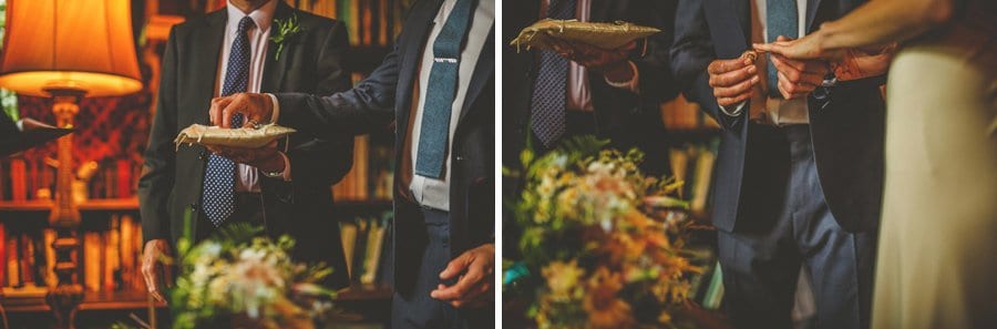 The bride and groom exchange wedding rings during the ceremony