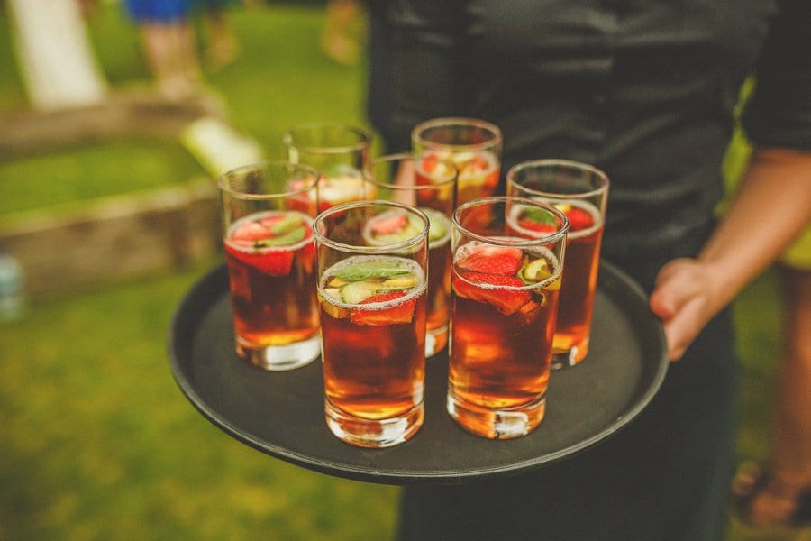 Drinks are served on a tray in the gardens