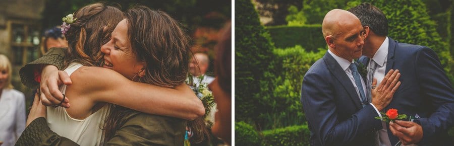 The bride and groom greet friends and family