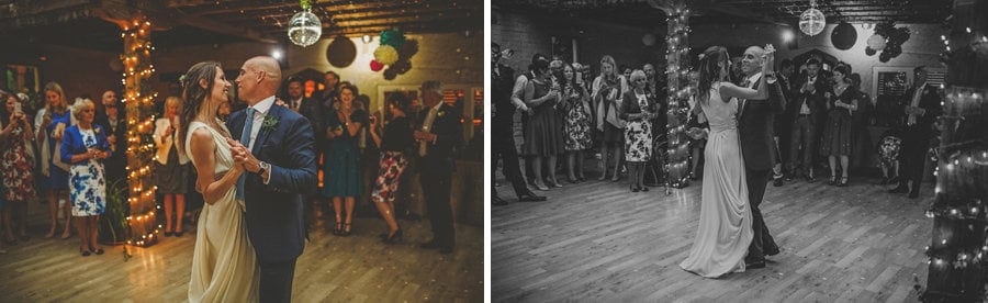 The bride and groom dance together on the dancefloor
