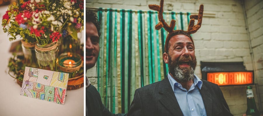 A man poses for a photograph in the photo booth