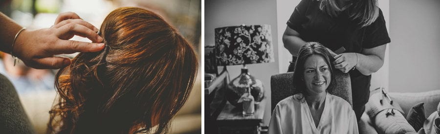 The hairdresser ties the back of the brides hair