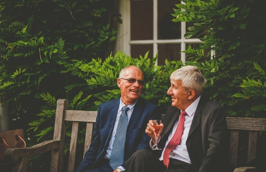 Wedding guests talk to each other