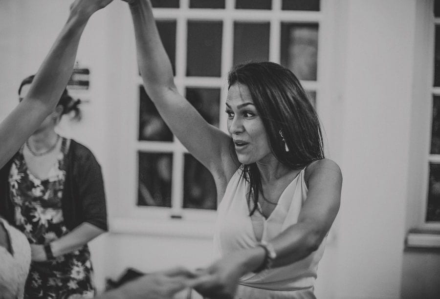 A wedding guest dancing