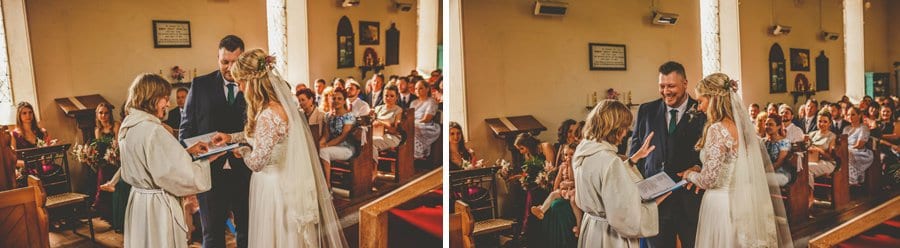 The bride picks up the wedding ring given to her by the vicar of the Church during the wedding ceremony