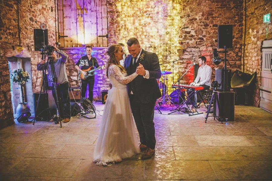 The bride and groom's first dance in the barn