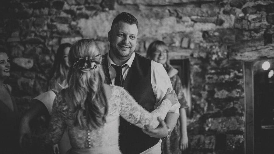 The bride and groom dancing together at Eden Barn