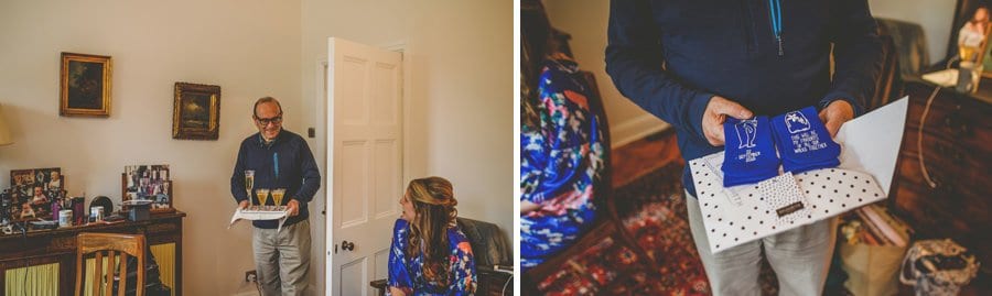 The bride's father opens a present given to him by the bride