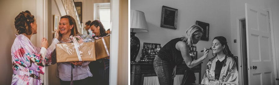 A lady walks into the room with a box of flowers and is greeted by the bride