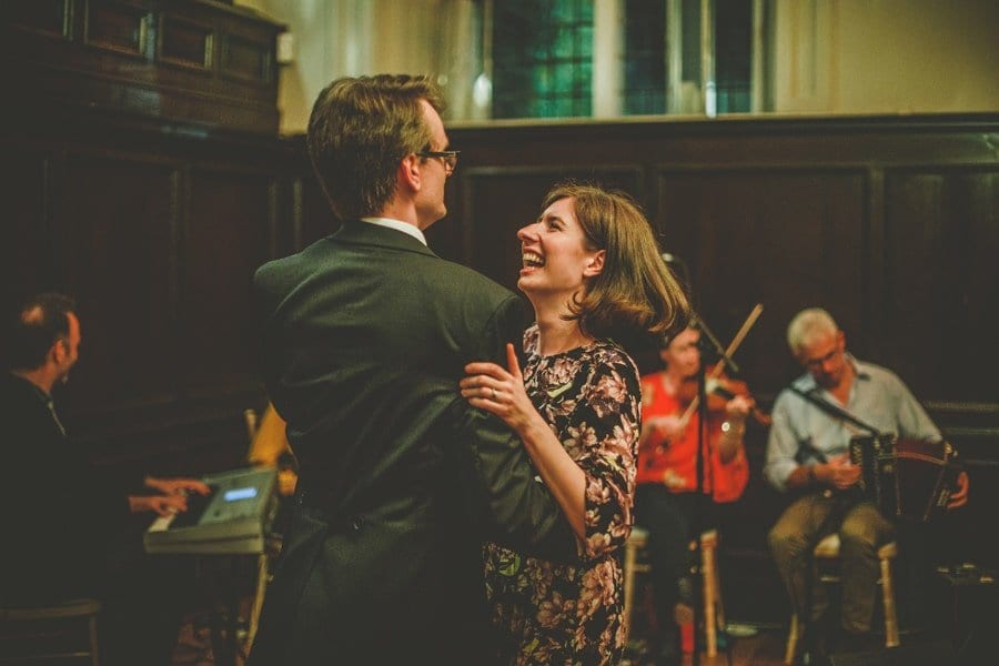 A man dances with his wife on the dancefloor at Fulham Palace