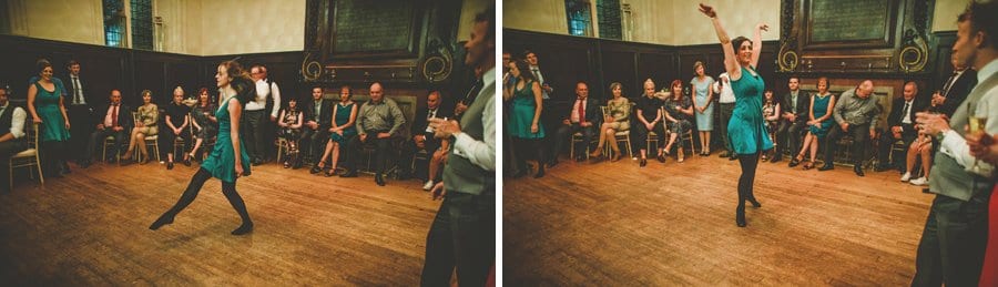 A lady dances in front of the wedding party at Fulham Palace
