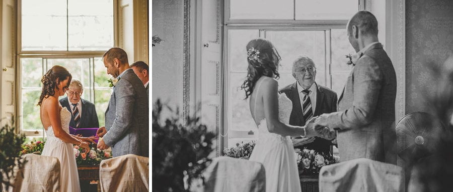 The couple exchange rings at Goldney Hall during the wedding ceremony
