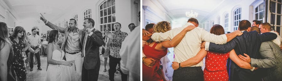 Wedding guests embrace each other on the dancefloor at Goldney Hall wedding venue in Clifton