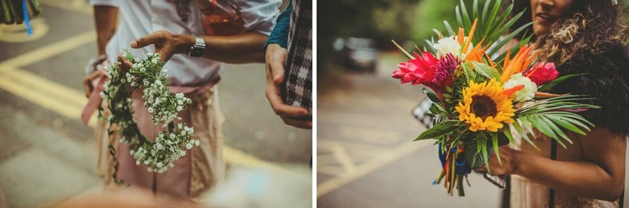 The wedding guests hold flowers