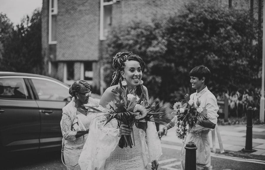 The bride walks towards friends and family