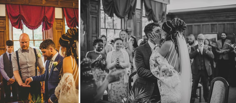 The bride and groom kiss each during the wedding ceremony