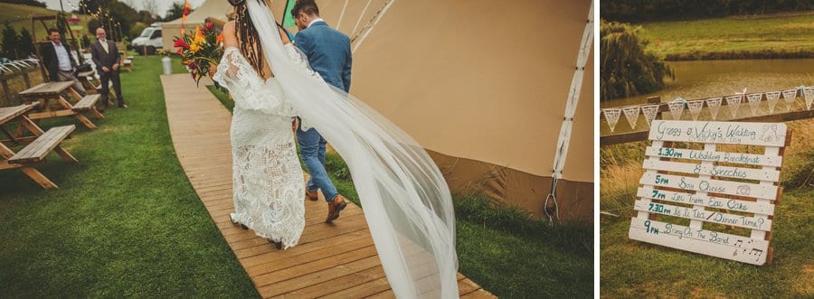 The bride and groom walk towards the tipi at Hadsham Farm in Oxfordshire