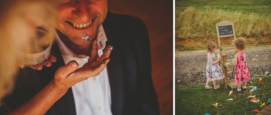 A lady paints glitter onto the face of a wedding guest in the tipi at Hadsham Farm