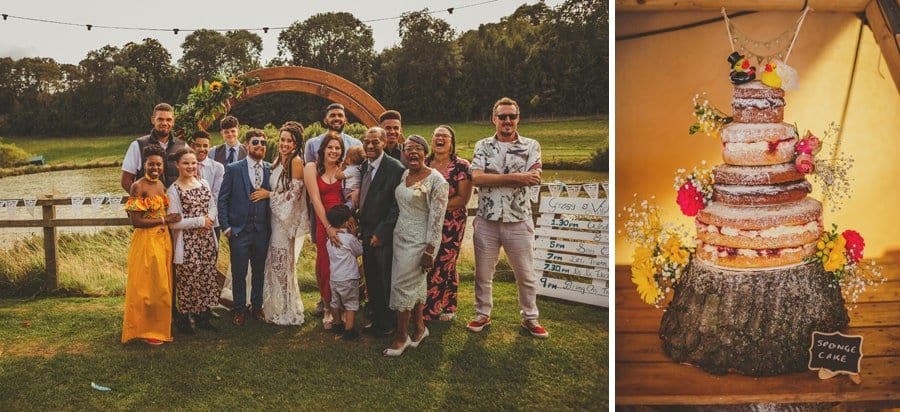 The bride and groom pose for a photograph and the wedding cake
