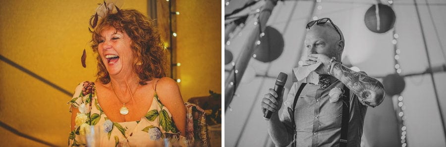 The best man puts his hand over his mouth and the grooms mother laughs