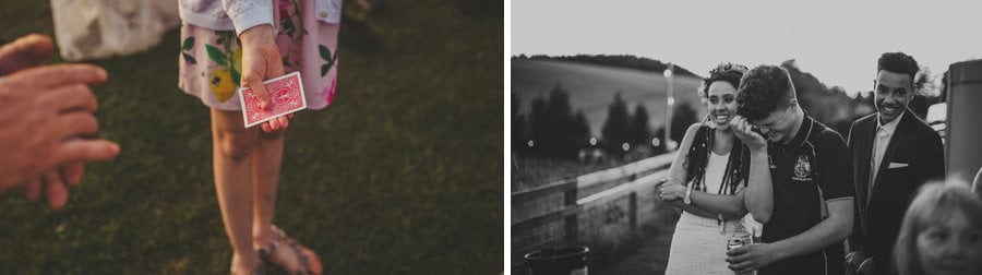 A girl holds a playing card in her hand