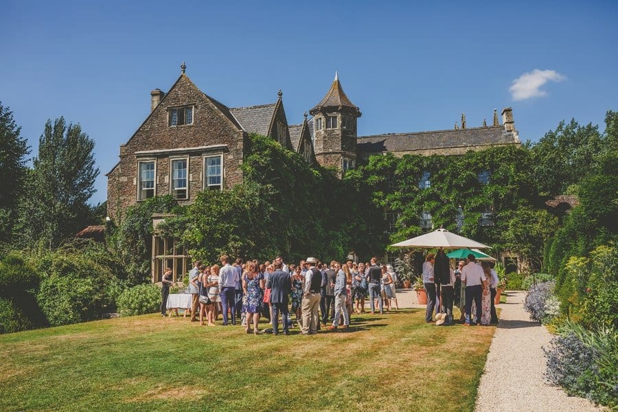 The wedding party in the gardens at Hanham Court