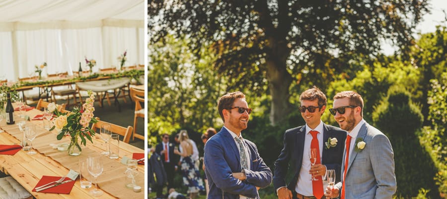 Wedding guests chat to each other and drink champagne