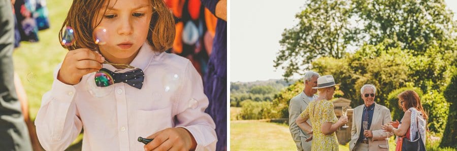 A little boy blows liquid bubbles