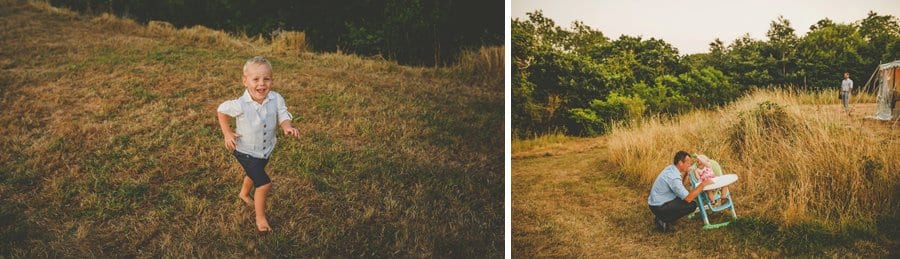 A man feeds his daughter in the gardens at Hanham Court