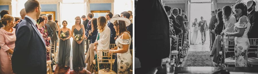 Bridesmaids enter the room at Kings Weston House in Bristol