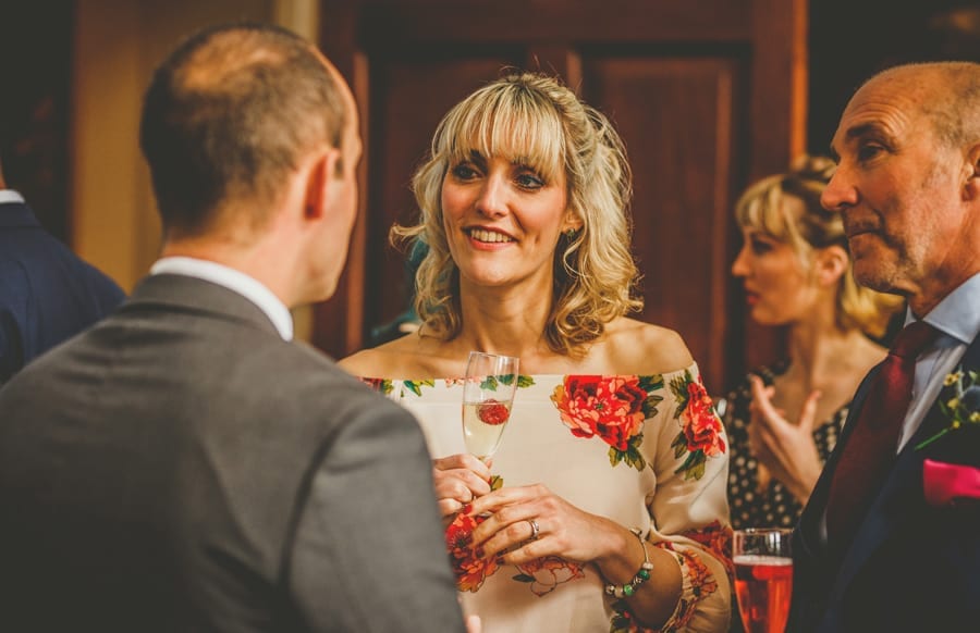 Wedding guests chat to each other