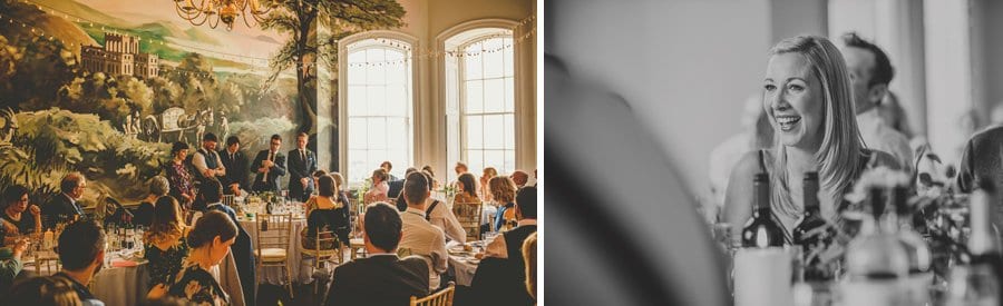 A bridesmaid laughs at a joke told by the best man during the wedding speeches