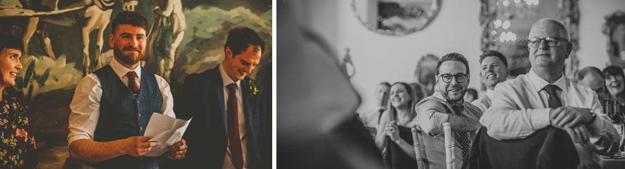 An usher smiles as he stands up in front of the wedding party and delivers his speech