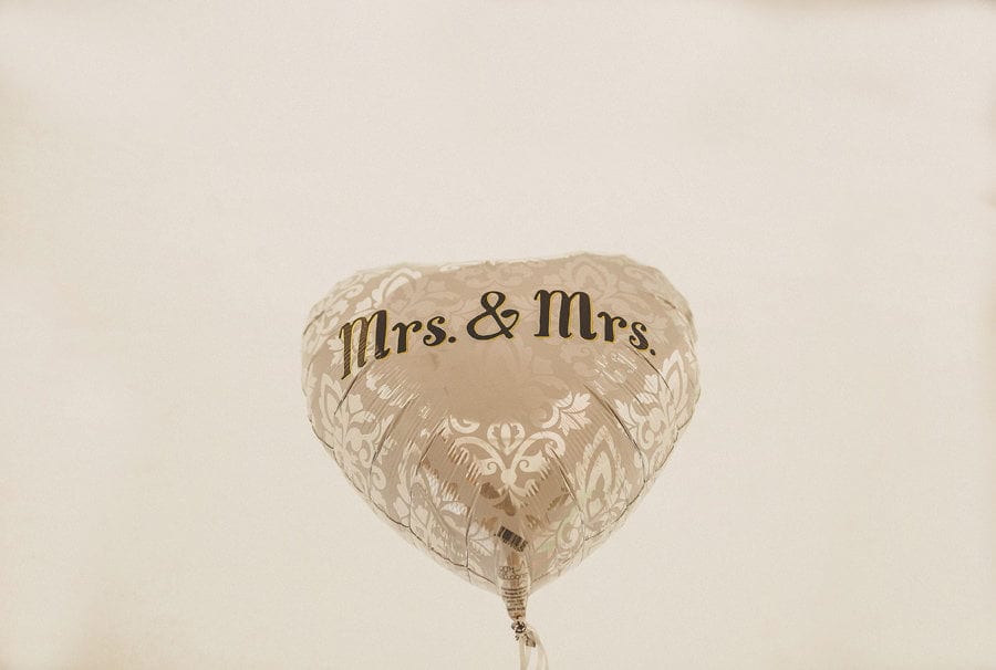 Little Quarme wedding photographer 0005 | somerset-wedding-photographer A balloon that has the words MRS and MRS printed on it