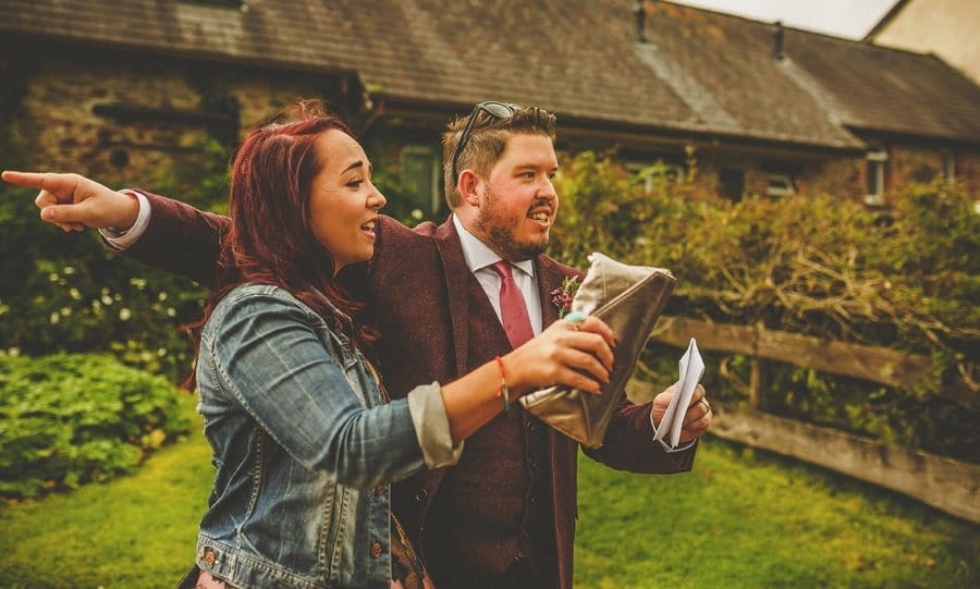 Little Quarme wedding photographer 0021 | somerset-wedding-photographer Wedding guests arrive for the outdoor wedding ceremony at Little Quarme Cottages