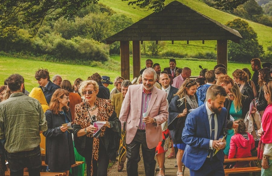 Little Quarme wedding photographer 0035 | somerset-wedding-photographer Wedding guests walk towards the wedding marquee