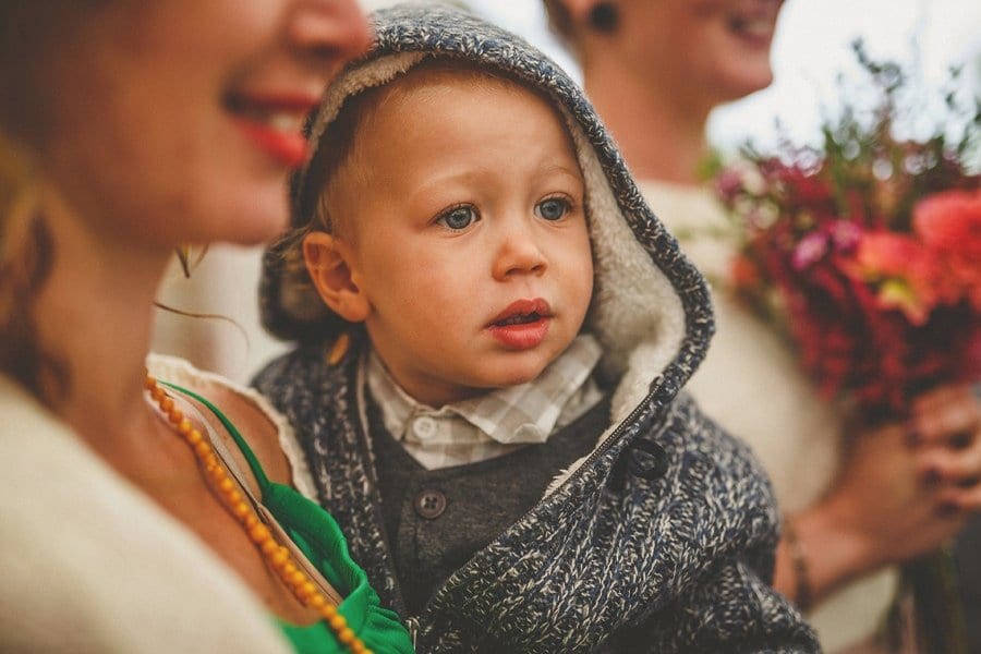 Little Quarme wedding photographer 0041 | somerset-wedding-photographer A little boy is held by his mother