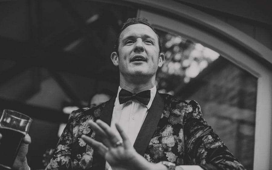 The best man talks to the wedding guests