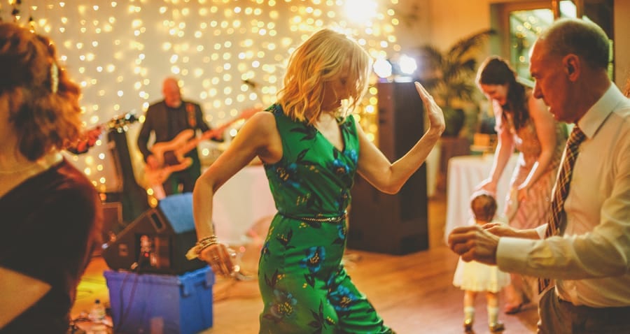 A wedding guest dancing