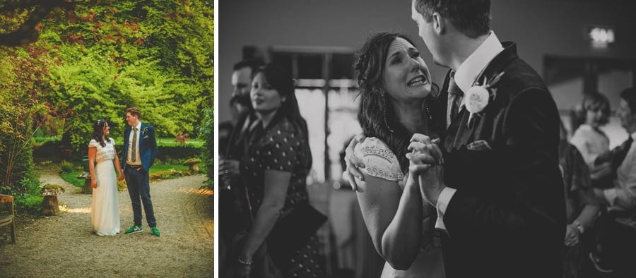 The bride and groom pose for a photograph in the gardens at the Matara Centre