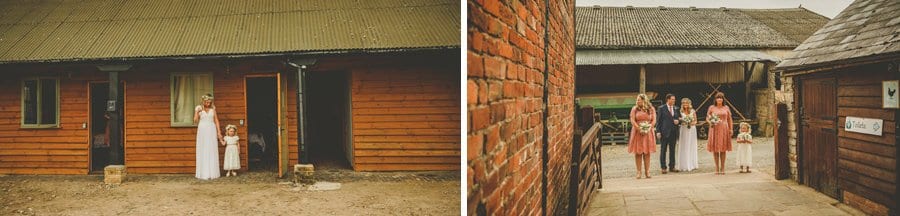 The bride and her daughter pose for a photograph in the courtyard
