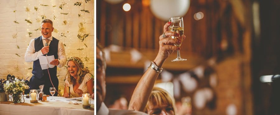 The groom stands up and delivers his speech to the wedding party