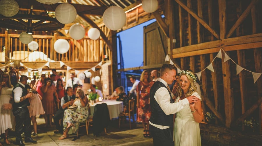 The bride and grooms first dance on the dancefloor at Over Barn