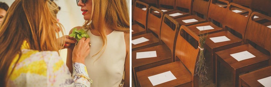 A lady straightens a bridesmaids flower