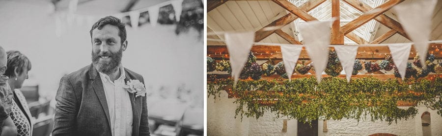 The groom smiles at a friend