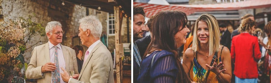 Wedding guest chat to each other in the courtyard
