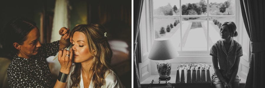 The make up artist applies mascara to the brides eyebrows in the master bedroom at Stubton Hall in Newark
