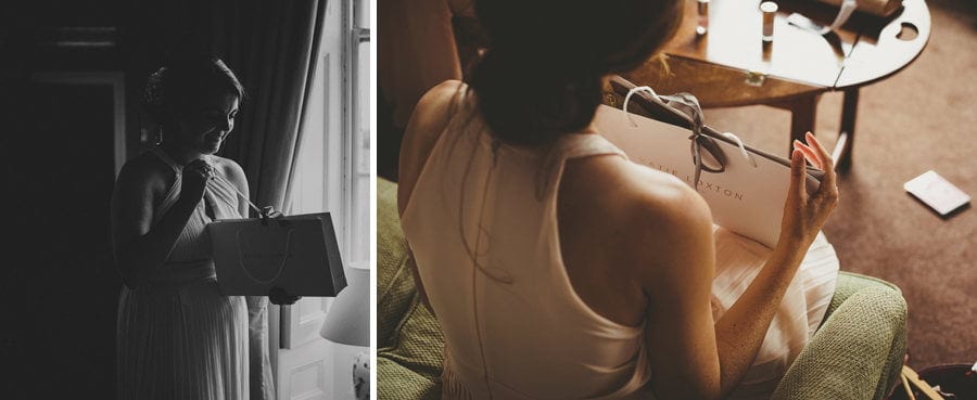 A bridesmaid holds her bag that was given to her by the bride