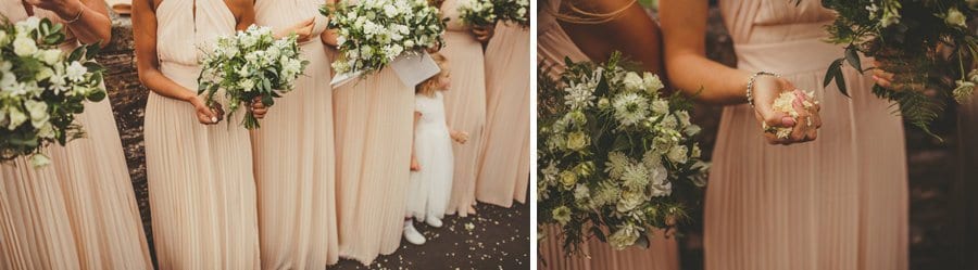 The bridesmaids flowers and a bridesmaid holds confetti in her hand